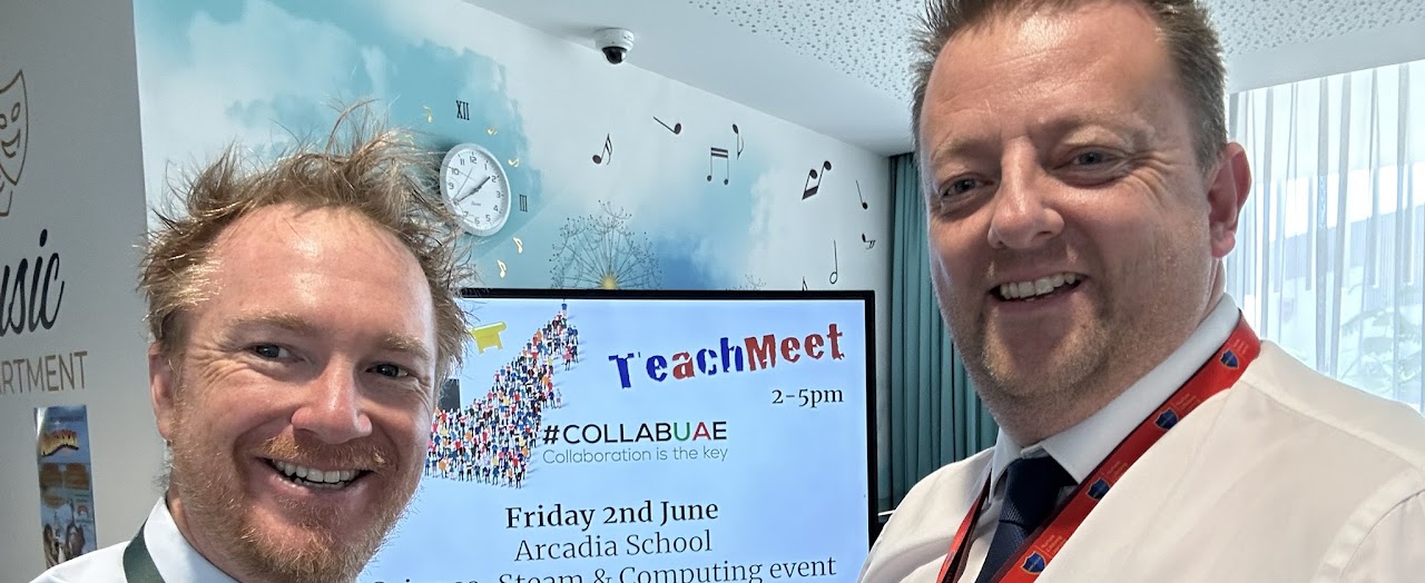 CollabUAE educators meeting at a community event with community branding visible behind them.